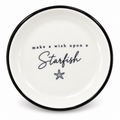 A  little 4 inch ceramic trinket tray inspired by sunny West Coast days salty wishes.  Finished with a black rim, make a wish upon  a Starfish lettering and a small starfish illustration. 

Perfect  for rings, earrings, keys or tiny keepsakes. 