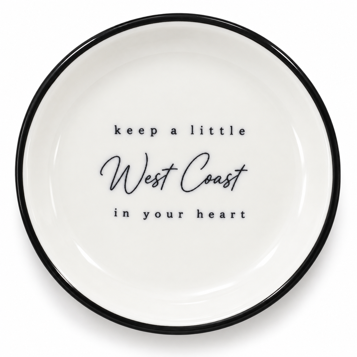 A little 4 inch ceramic trinket tray inspired by the place we a;ways carry with us - the West coast. Finished with a black rim and message keep a little West Coast in your heart. 

Perfect for rings, earrings, keys or tiny keepsakes. 